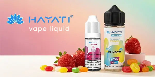 Hayati Pro Max Rainbow 100ml and Strawberry Jelly Beans 10ml e-liquids displayed with fresh strawberries and candy.