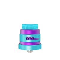 Colourful vape RDA with blue and purple design, featuring airflow slots.