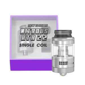 Stainless Steel Nitrous RTA 22mm placed in front of its box labelled 'New Edition Single Coil' in purple and white.