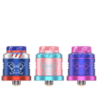 Three Hellvape Dead Rabbit Solo RDAs in red, pink, and blue, 6th Anniversary Edition.