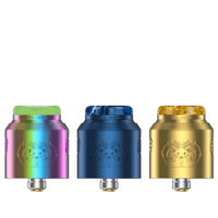 Three Hellvape Drop Dead 2 RDAs in rainbow, blue, and gold, displayed side by side.