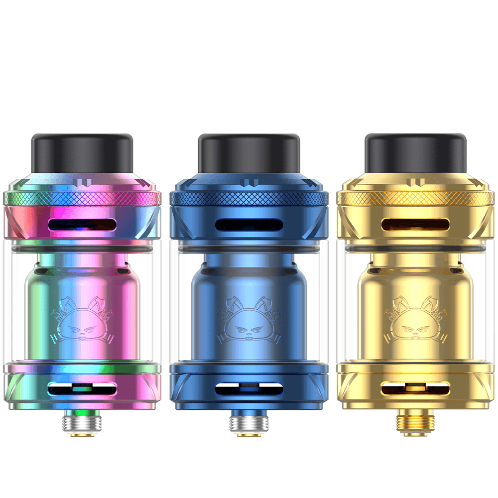 Three Hellvape Fat Rabbit 2 RTAs in rainbow, blue, and gold, displayed side by side.