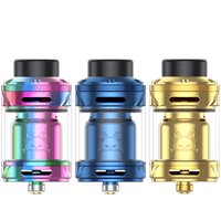 Three Hellvape Fat Rabbit 2 RTAs in rainbow, blue, and gold, displayed side by side.