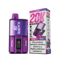 Kabri 20K Ultra Vape Pod Kit in the flavour combination of Rainbow and Gummy. The pod kit is presented with a vibrant purple colour, reflecting its flavour themes. The packaging highlights key features, including "Legal Big Puff," a capacity for 20K puffs, a dual-flavour twist system, and an 1150mAh rechargeable battery. The product also displays a digital battery indicator on the pod and contains two 20ml compartments for different flavours. 