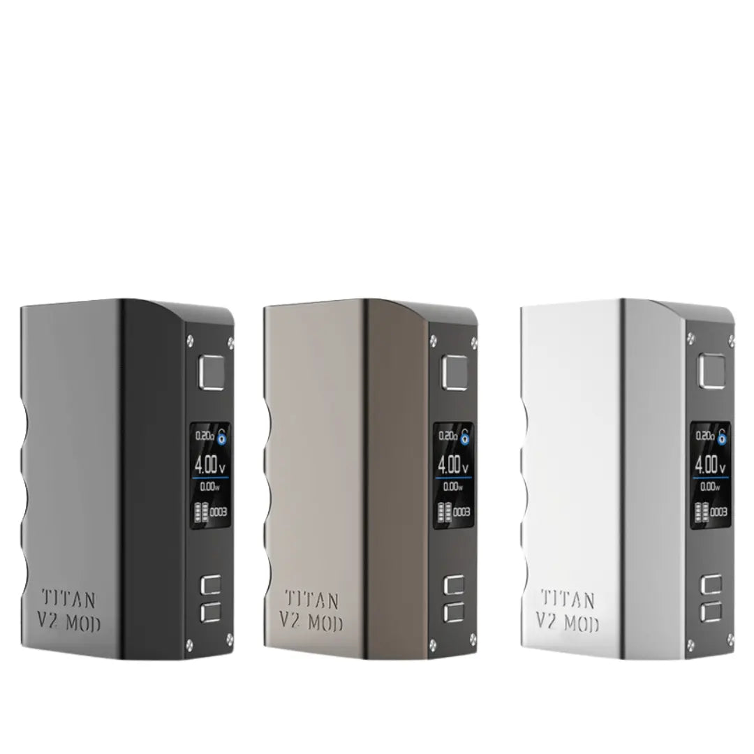 Steam Crave Titan V2 Box Mod in three colours: black, gunmetal, and silver. Each mod features a digital display screen showing vaping settings, with a sleek, ergonomic design.