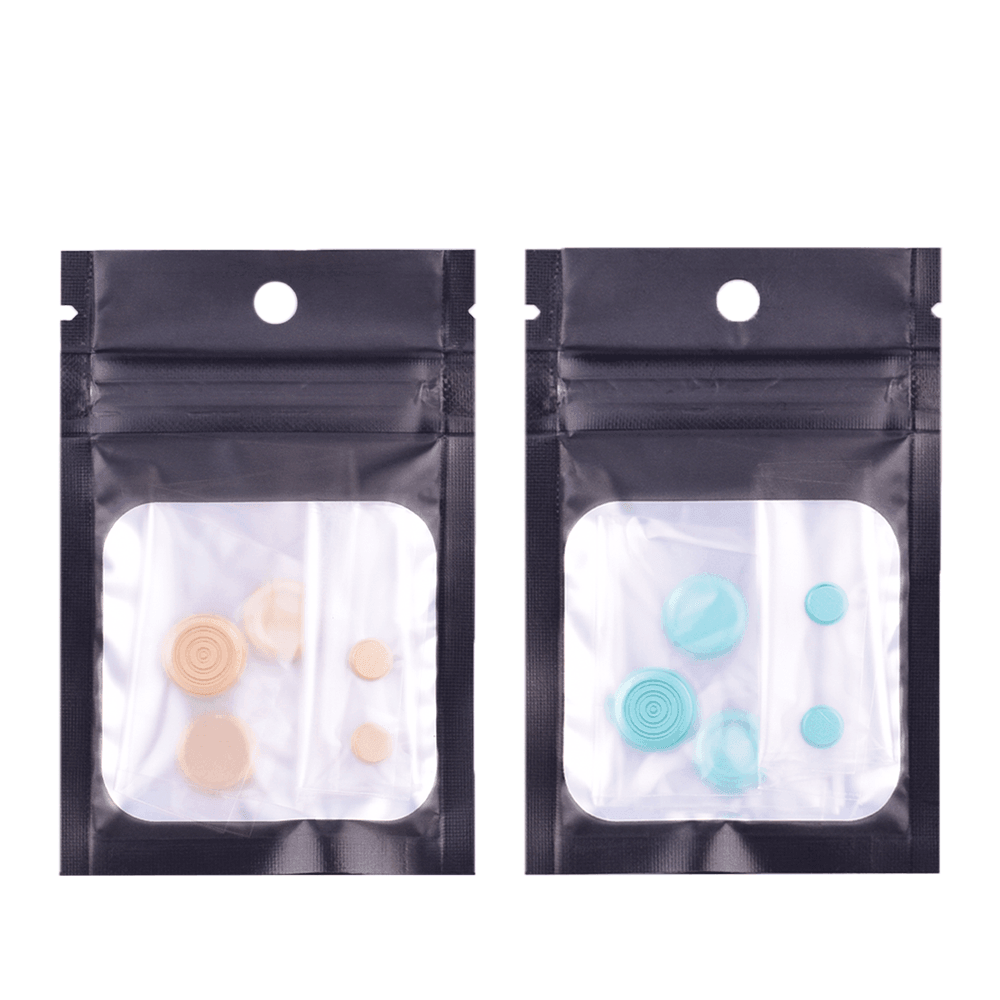 Two sets of colourful button kits in clear pouches for vaping devices.