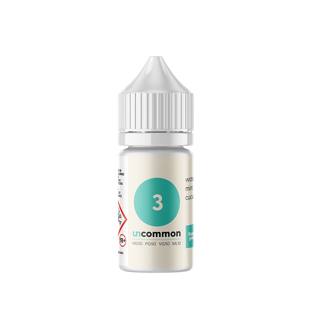 Vape juice bottle with white cap and "uncommon" label.