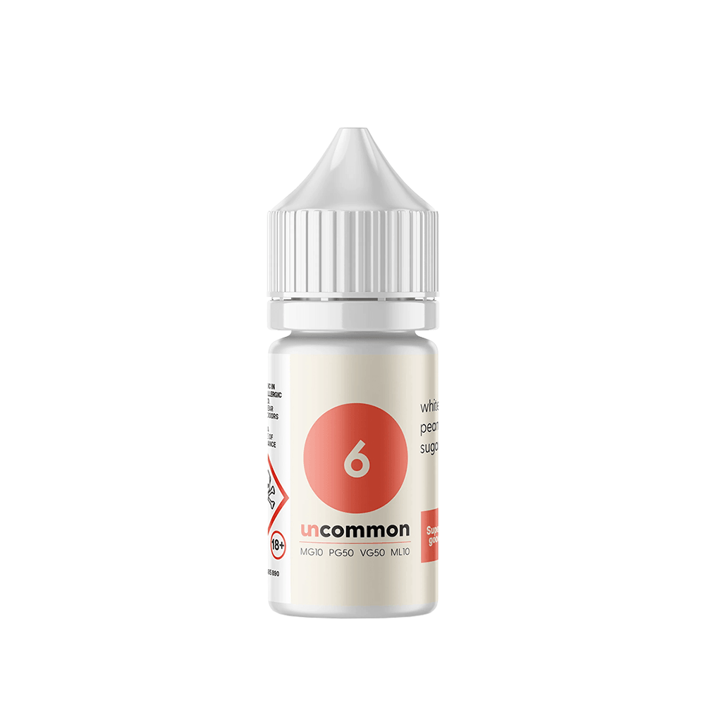 A 10ml bottle of Uncommon vape salt with a white and orange label.