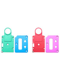 Colourful e-cigarette replacement panels in green, blue, red, and pink.