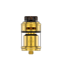 Gold vape tank with clear chamber and black drip tip, featuring a flame logo.