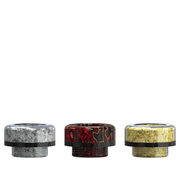 Three colourful 810 drip tips with marbled designs in grey, red, and yellow.