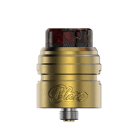 Gold Blaze Solo RDA with a marbled black and red drip tip.