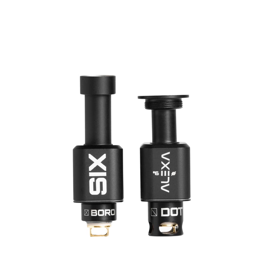 Two black Alexa Bridge vape components, labeled "SIX" and "VEXY", with gold connectors.