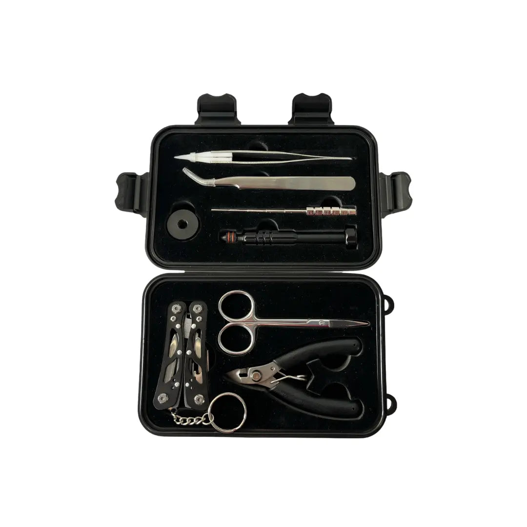 vape coil building kit in a black protective case, showcasing neatly arranged tools including tweezers, scissors, pliers, and a screwdriver, all set within a custom foam interior for secure storage