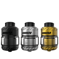 Three Thunderhead Creations Blaze Max RTA tanks in black, silver, and gold.