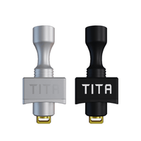 Silver and black Tita X RBA vape accessories on white background.